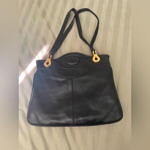 Chic Black Leather Shoulder Bag with Gold Accents and Attached mirror